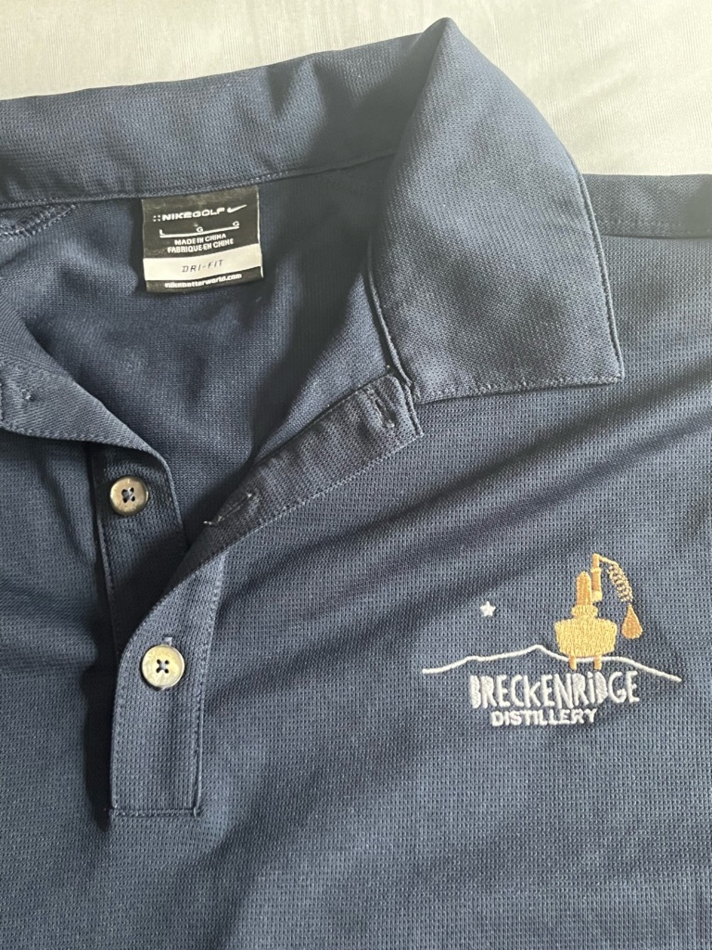 Nike Golf Men’s Navy Blue Polo with Breckenridge Distillery Embroidery Size L